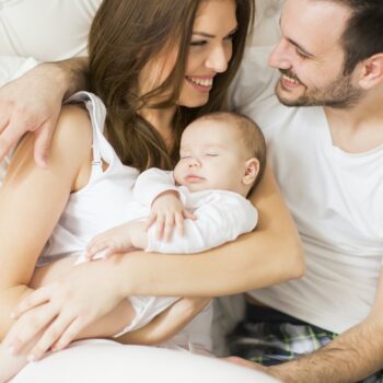 Happy family with newborn baby